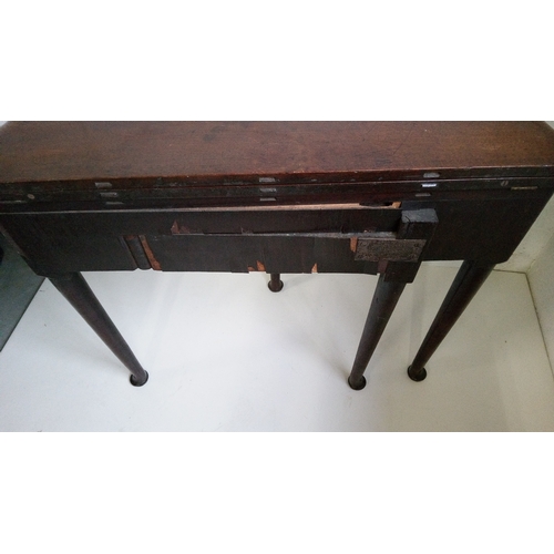 763 - A Mahogany Fold Over Table On Pad Feet In Need Of Repair To Back leg As Pictured.
74cm High,89cm Wid... 