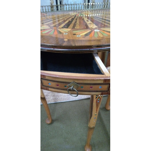 3 - A Parquetrey console Demi-lume table with over thirty exotic veneers including Tulip wood, Black Bea... 