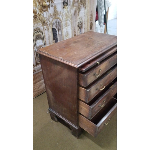 403 - Batchelors chest with moulded top over brushing slide and four graduating drawers.
slight damage as ... 