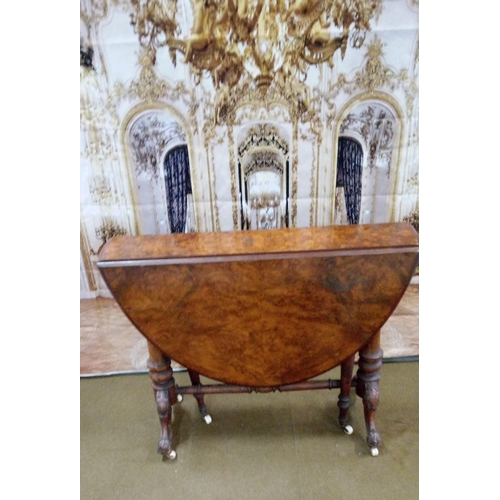 407 - Antique Burr Walnut gateleg table with turned and carved legs, ceramic casters.
Top in need of atten... 