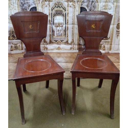 420 - A Pair of Antique Regency Hall Chairs with Lion Motif.
Signs of previous woodworm