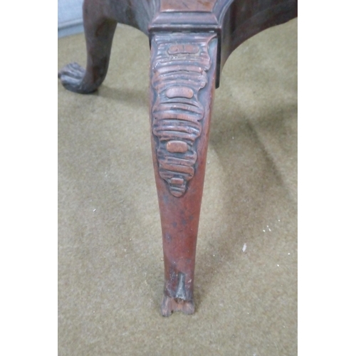 431 - A Georgian tripod Table with oval top and heavily carved  legs and base. central column has been rep... 