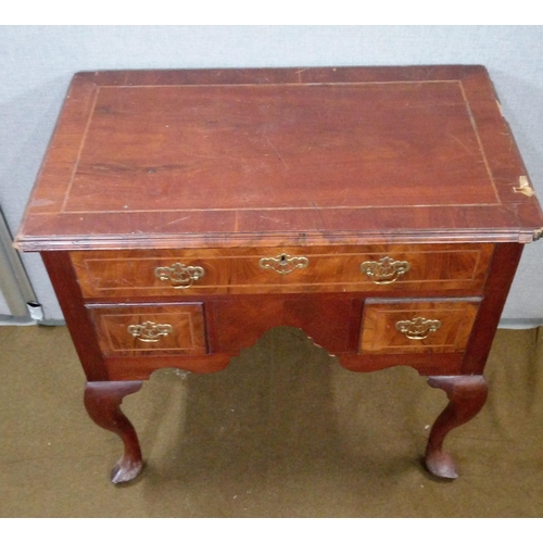 432 - A 19th Century Queen Anne Style Lowboy on cabriole legs with Pad feet.
Damage as pictured.
74cm high... 