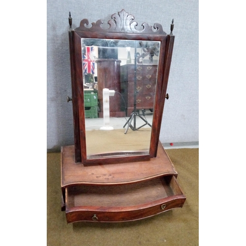 435 - A Georgian Toilet Mirror with drawer, carved detail on top,  One back foot missing as pictured.
60cm... 