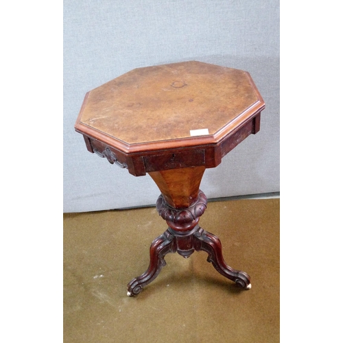 440 - A Victorian Sewing Table Fitted interior with some open tops and some with  lids.
Carved Tripod Base... 