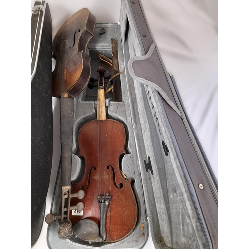 543 - A Collection of Five Violins in Varying states of disrepair. Three with Cases, none with bows. Broke... 