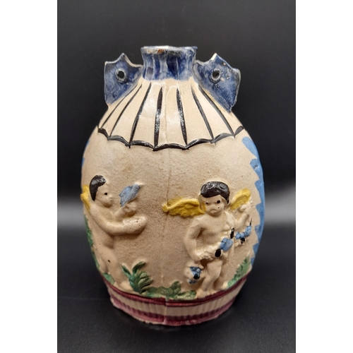 312 - Two Items of Prattware, A Rare Prattware Spirit Flask c1800 moulded with a neoclassical scene of the... 