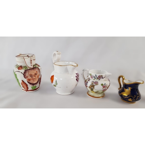 258A - A Collection of Four Antique Miniature Jugs in Various Styles. Ranging in height between 7-4cm.