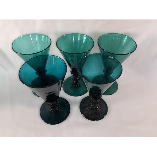 71A - A Selection of Coloured Glassware in Greens and Blues including Goblets,Small Decanters, Jug, A Lidd... 