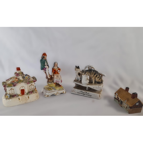 82A - A Mixed Collection of Four China Ornaments including A Staffordshire House and Conta Boehme Cats wit... 