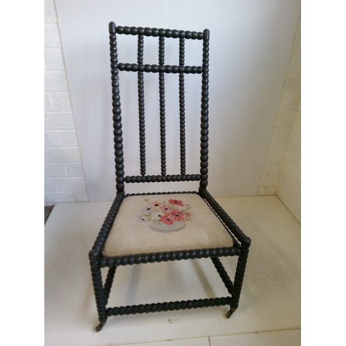 783 - A 19th Century Bobbin ChairOn Castors.
108cm High,59cm Wide,39cm deep