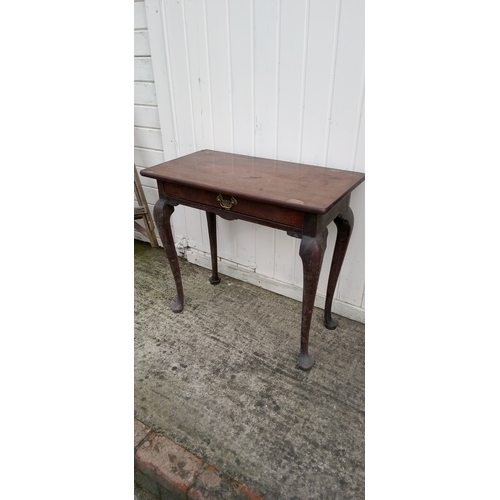 912 - A Georgian Side Table  With Drawer On Cabriole Legs And Pad Feet. 72cm High,78cm Wide,42cm Deep.