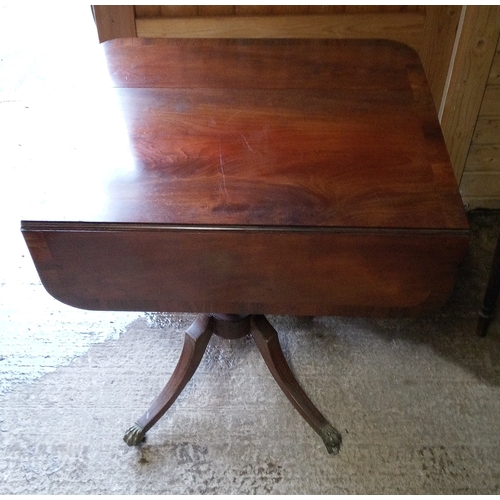 963 - An Antique Drop Leaf Table with Central Column and Brass Clawed Feet. Support on one side missing. 6... 