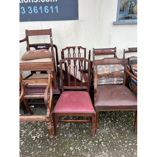 1273 - A Large Collection of Mismatched Antique Chairs and Seats.