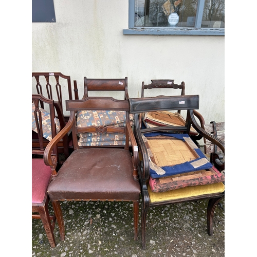 1273 - A Large Collection of Mismatched Antique Chairs and Seats.