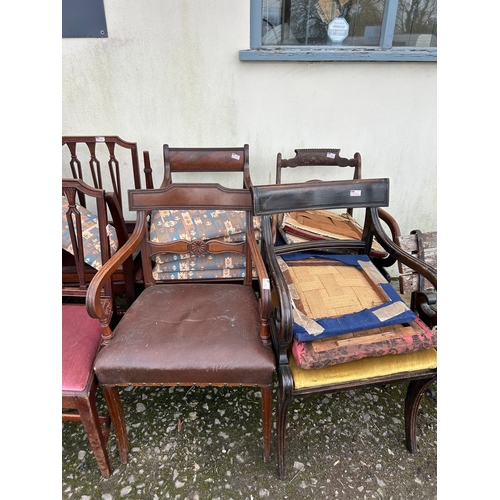 1273 - A Large Collection of Mismatched Antique Chairs and Seats.