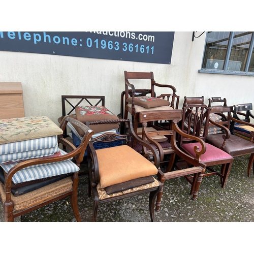 1273 - A Large Collection of Mismatched Antique Chairs and Seats.