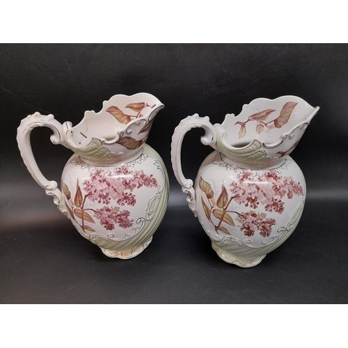 200 - Two Large Wash Jugs, one with a staple repair.