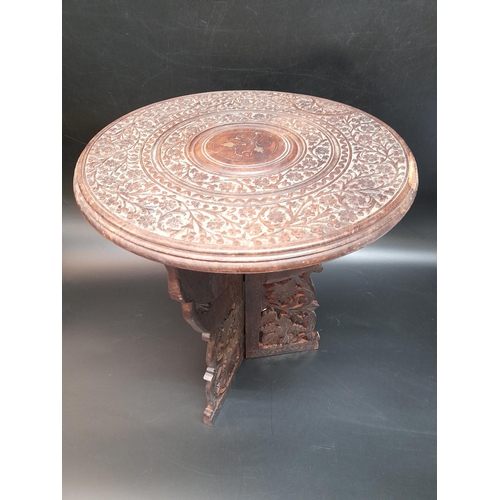 201 - A Heavily Carved, Brass Inlaid Folding Tea Table.