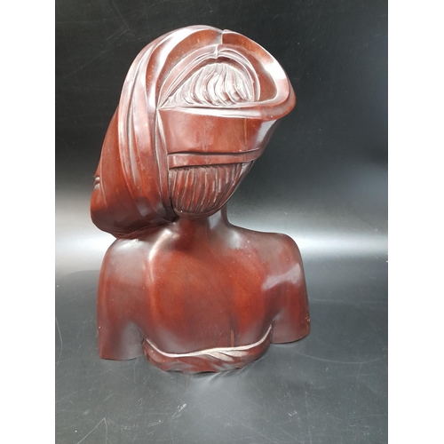 208 - Two Indonesian Carved Wooden Busts.