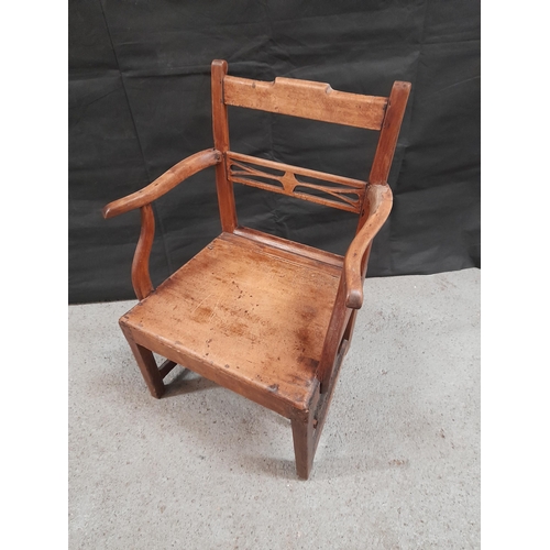 216 - A Georgian Oak Arm Chair.