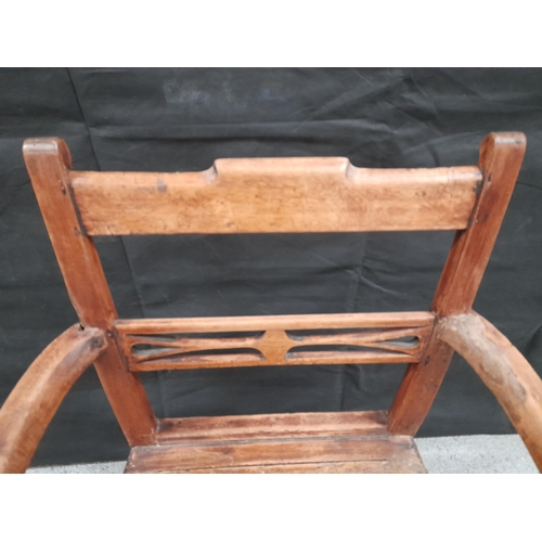 216 - A Georgian Oak Arm Chair.