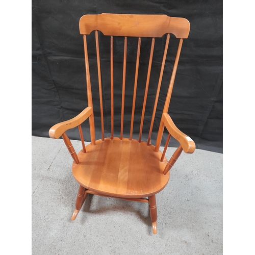 217 - A Spindle Back Rocking Chair.