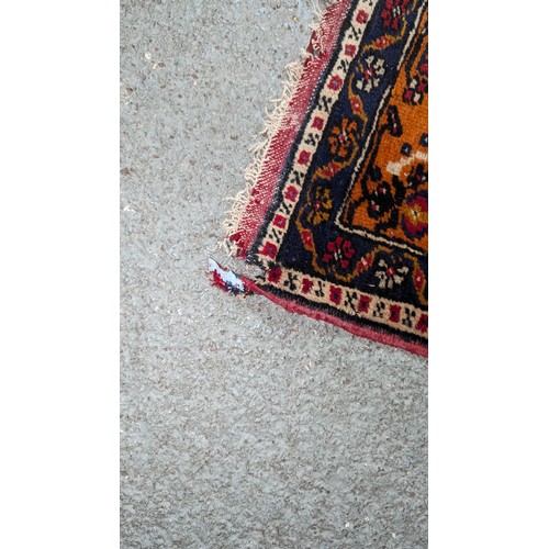 117 - A Handmade Persian Carpet 274 x 182cm. 

NB. Slight Fray on One Corner.