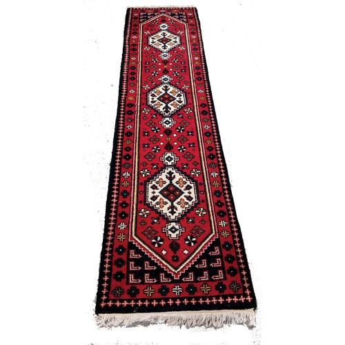 118 - An Indian Kamedan Carpet Runner. 70 x 290cm.