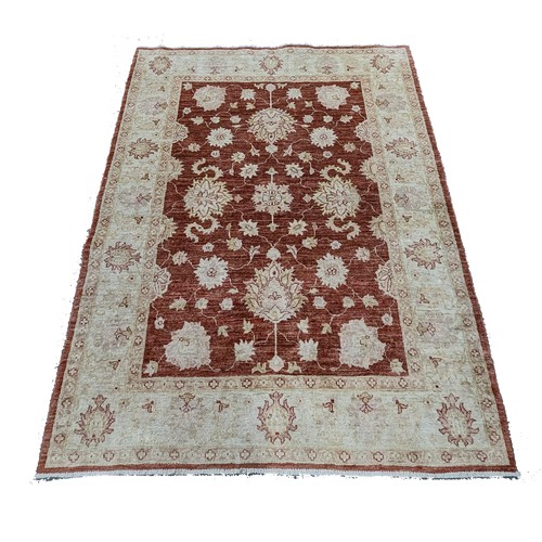 119 - A Handmade Wool Rug 205 x 155cm.