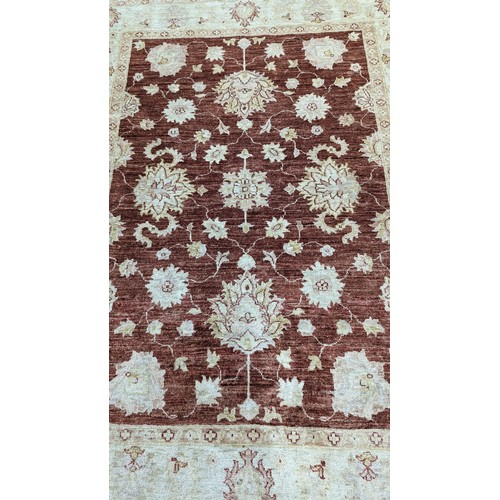 119 - A Handmade Wool Rug 205 x 155cm.