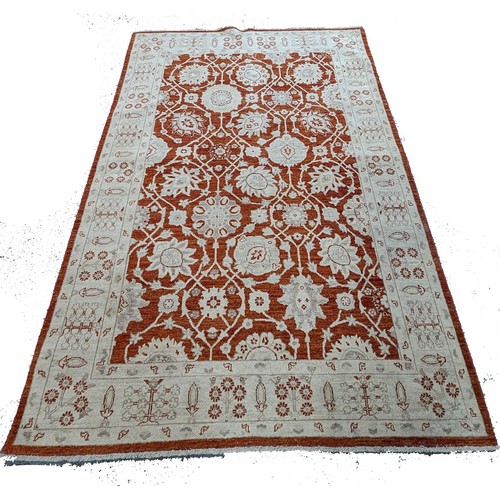 120 - A Handmade Wool Rug, 265 x 180cm.