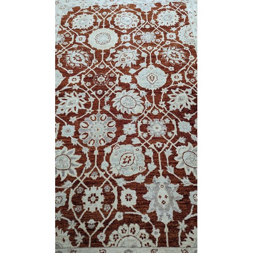 120 - A Handmade Wool Rug, 265 x 180cm.