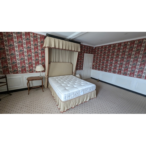 182 - A double duvan bed with heaboard, a firm john lewis master bedmaker mattress and a canopy