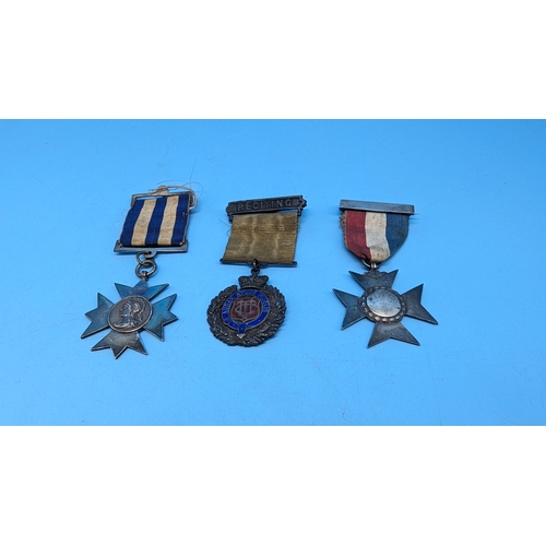 595 - Three Silver Regimental Medals and Crosses.