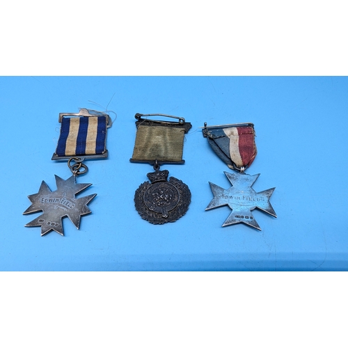 595 - Three Silver Regimental Medals and Crosses.