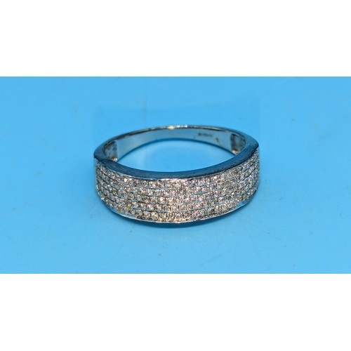 418 - A 9ct White Gold Ring encrusted with Diamonds. Size R.