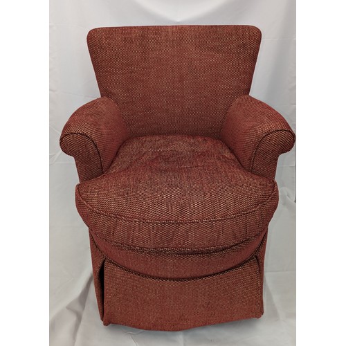 132 - An upholstered armchair