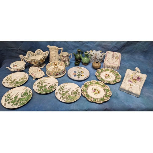 130 - An assortment of antique Chinaware plates and jugs including: Faience and creamware feeding cup, che... 