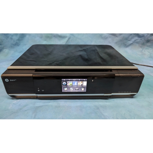 816 - An HP Envy 114 wireless Thermal printer, scanner, fax with touchscreen. (requires ink)