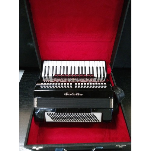 484 - A Black Galotta Accordian in Hard Carry Case.