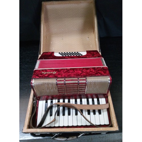 485 - A Red Galotta Accordian.