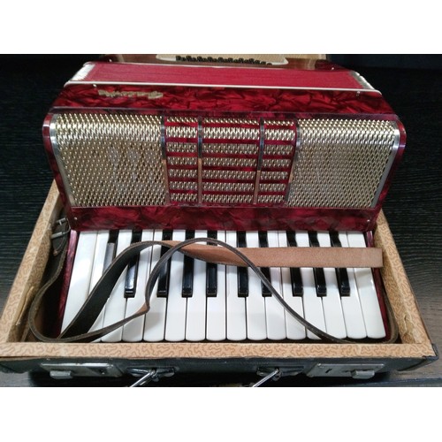 485 - A Red Galotta Accordian.