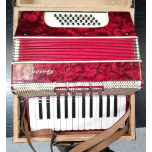 485 - A Red Galotta Accordian.