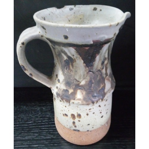 490 - Two Large Studio Pottery Pitchers and an Urn. Smaller Jug has been repaired.