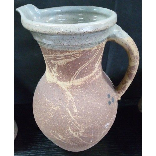 490 - Two Large Studio Pottery Pitchers and an Urn. Smaller Jug has been repaired.