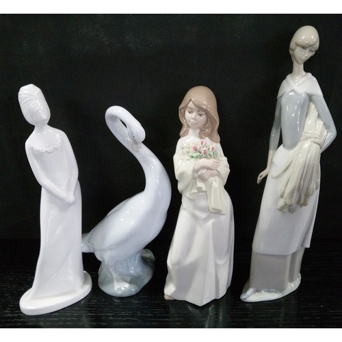 499 - Four Lladro Style Figures.