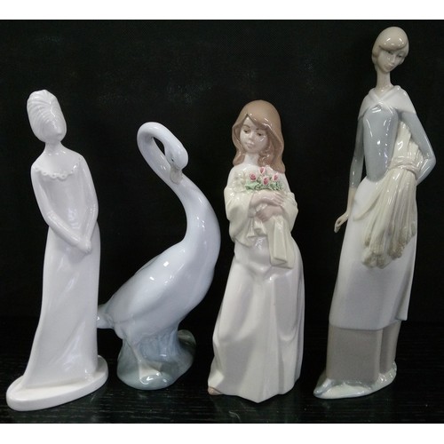 499 - Four Lladro Style Figures.