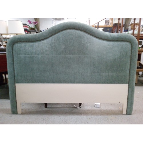 186 - A teal fabric covered double bed headboard