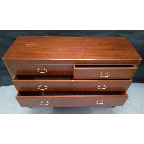 464 - A Four Drawer Chest with Brass Handles. 78cm H x 115cm W x 42cm D.